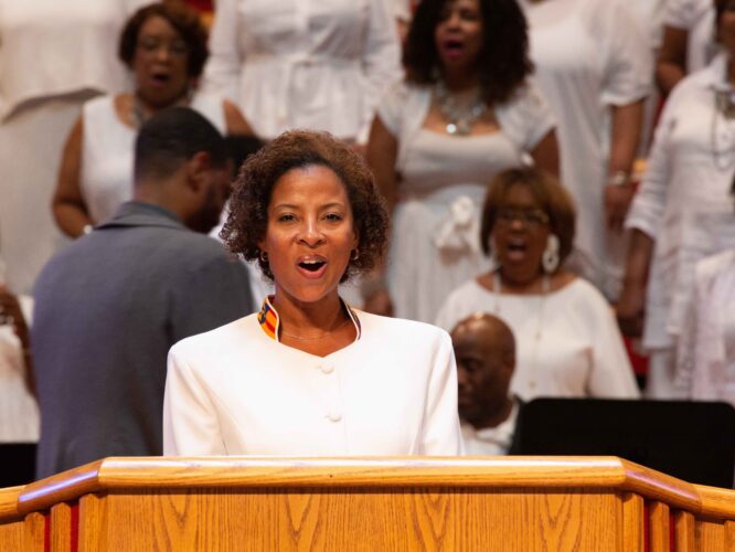 Woman singing in church